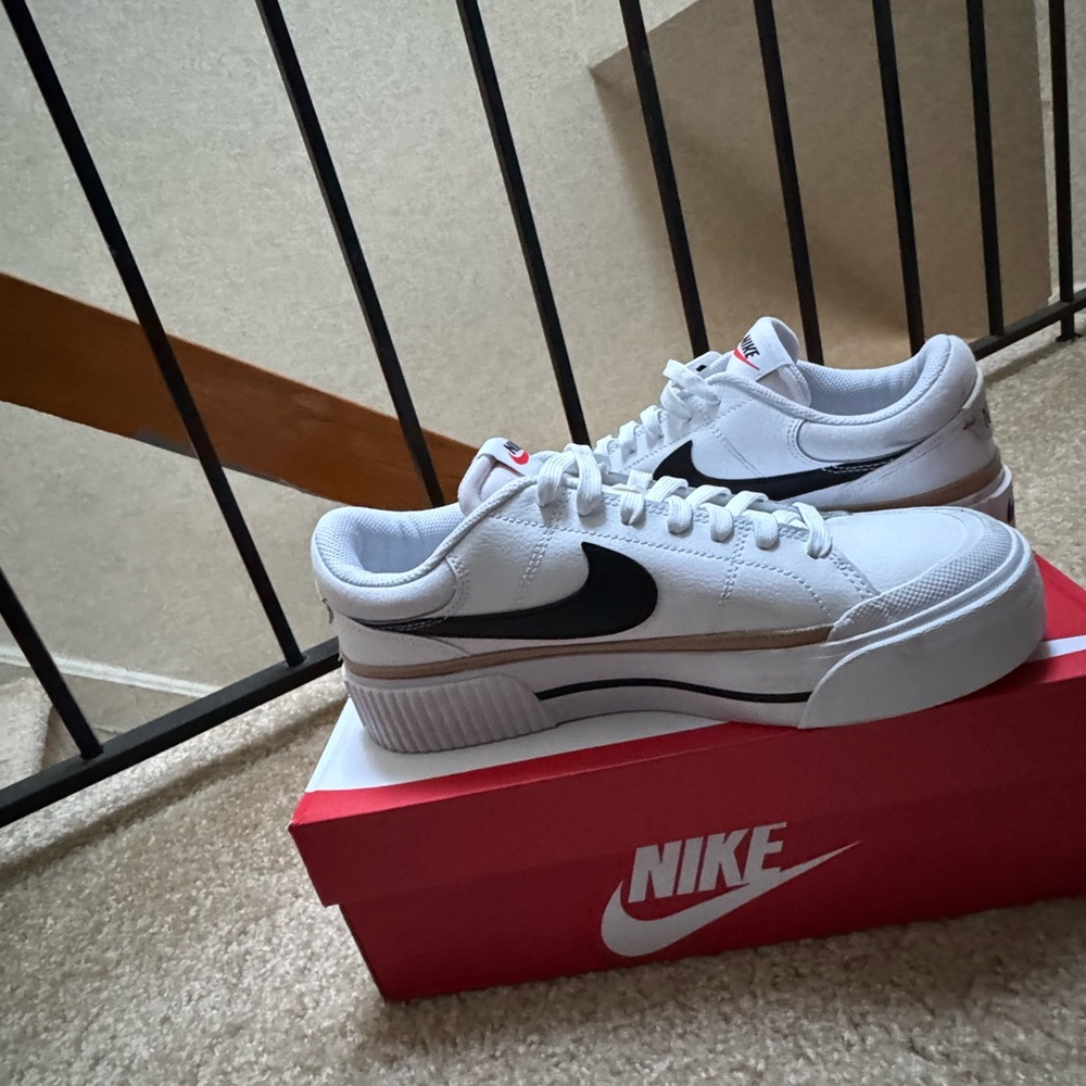 Nike Men's White and Black Sneakers with Red Accents